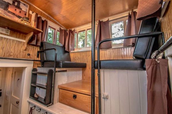 https://www.wideopencountry.com/wp-content/uploads/sites/4/2017/10/Caboose-interior.jpg?resize=600%2C399