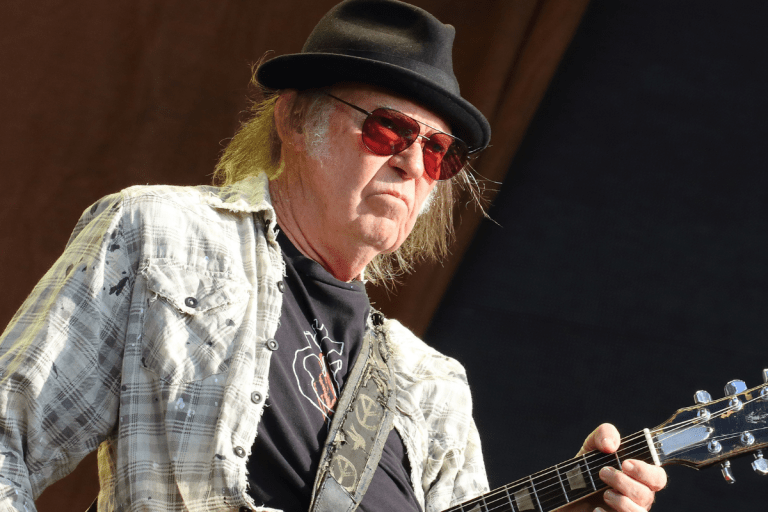 Neil Young Pulls Music From Spotify in Protest over Joe Rogan Podcast