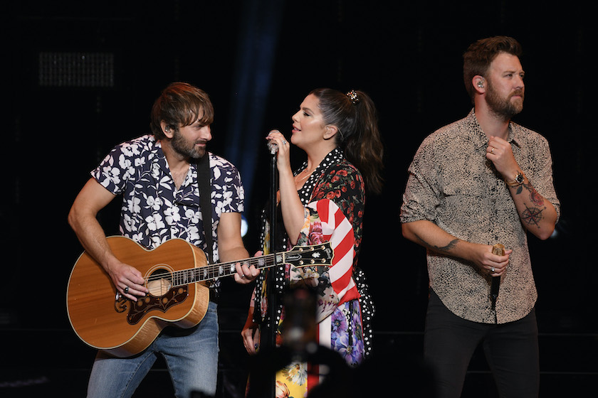 WANTAGH, NEW YORK - JULY 30: (L-R) Musicians Dave Haywood, Hillary Scott and Charles Kelley of Lady A perform onstage during 