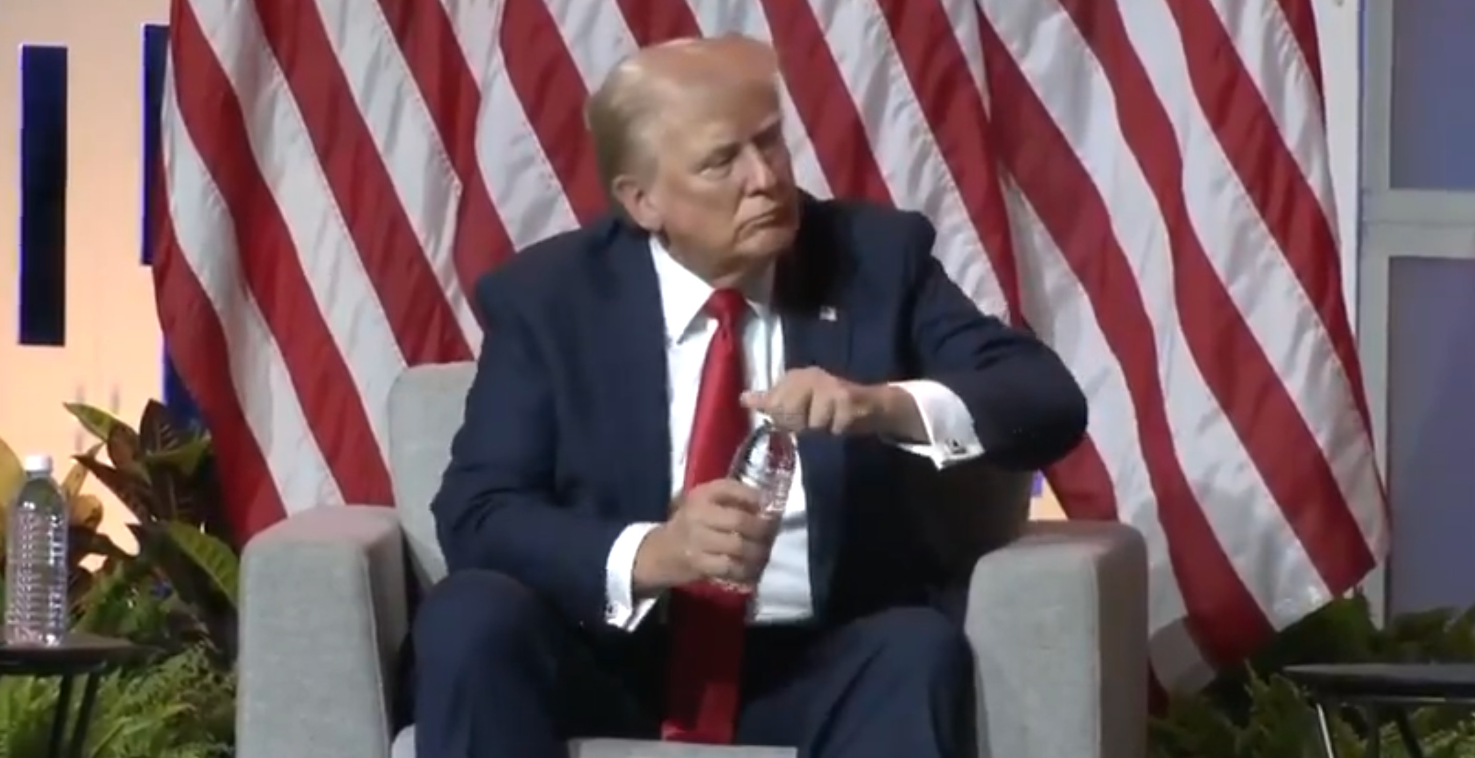 Donald Trump Just Stole A Reporter's Water Bottle And The Internet Has Thoughts