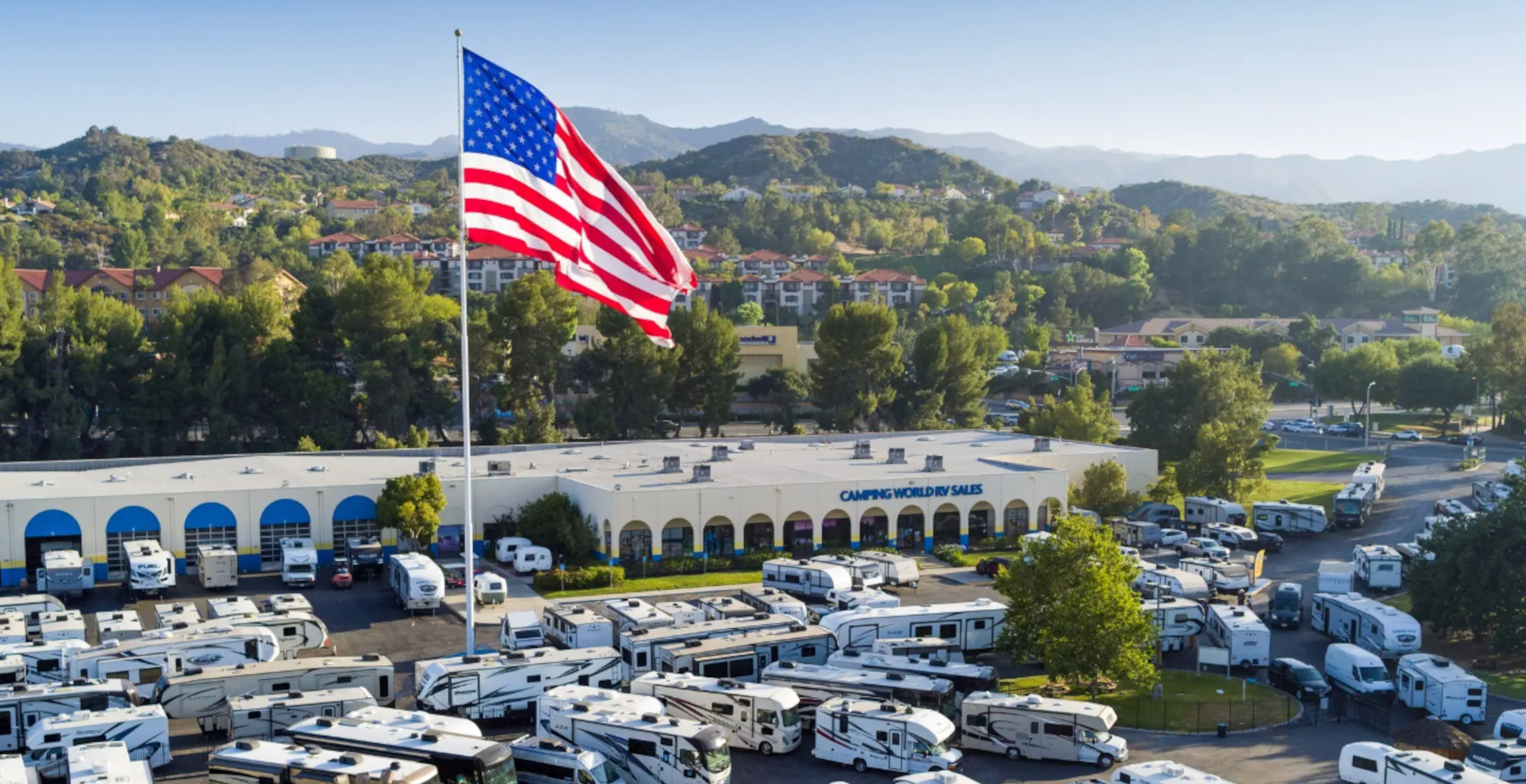 Camping World defiantly displays the American flag after California authorities ordered it to be taken down