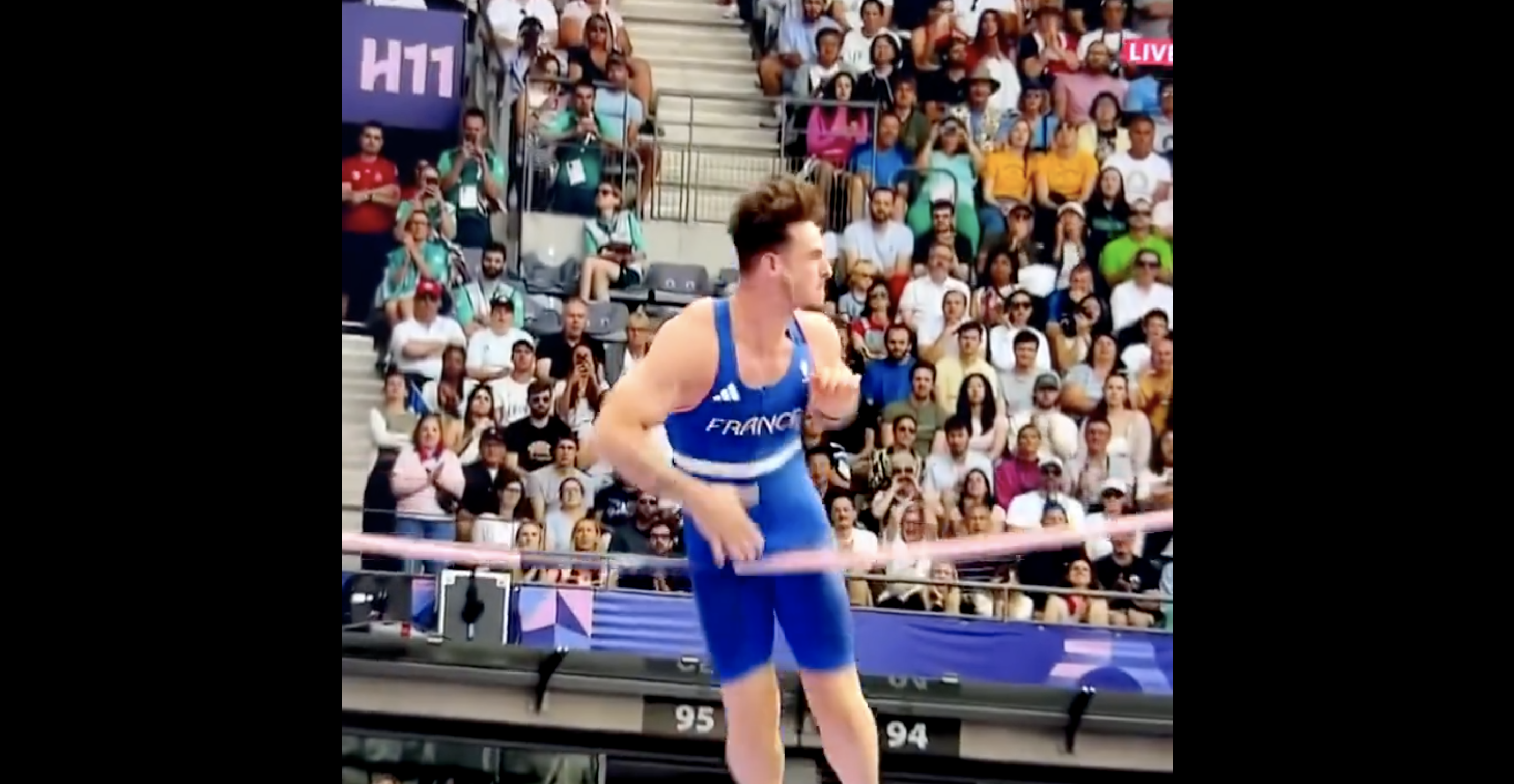 Well Endowed Olympic Pole Vaulter Knocks Down Pole With Unexpected Assistance