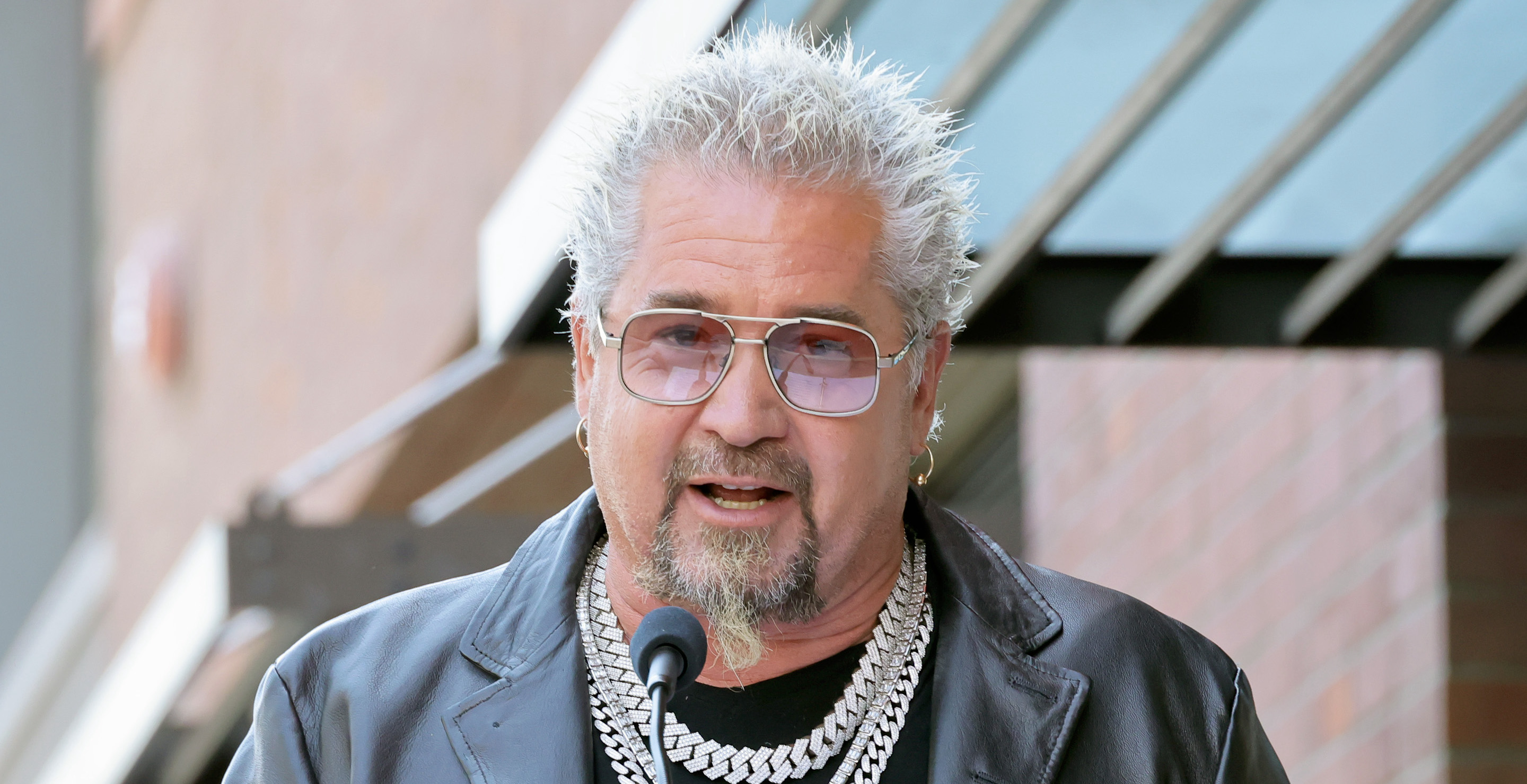 Guy Fieri Recalls Being Mistaken For a Bartender At Sylvester Stallone's House