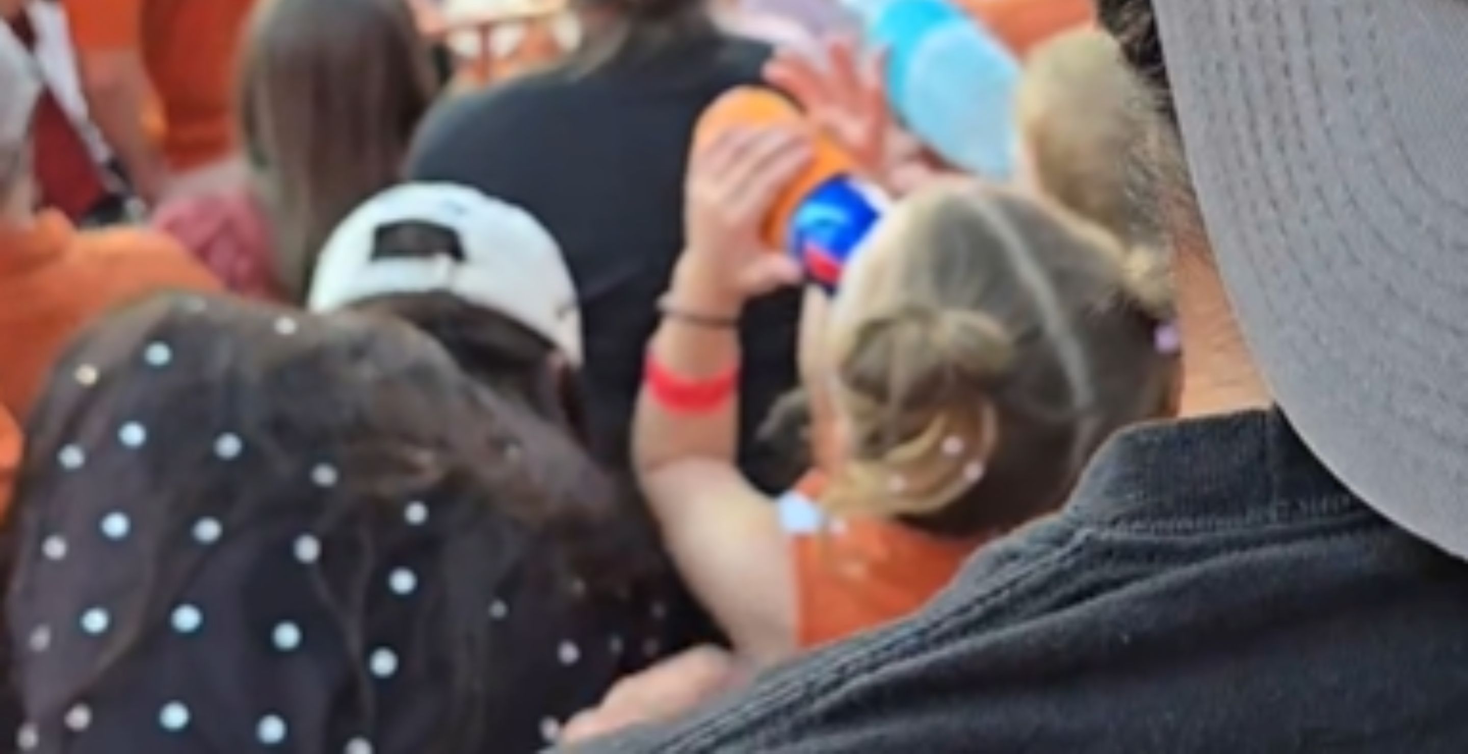 Young Child Appears To Guzzle Beer At Texas Longhorns Game In Viral Video