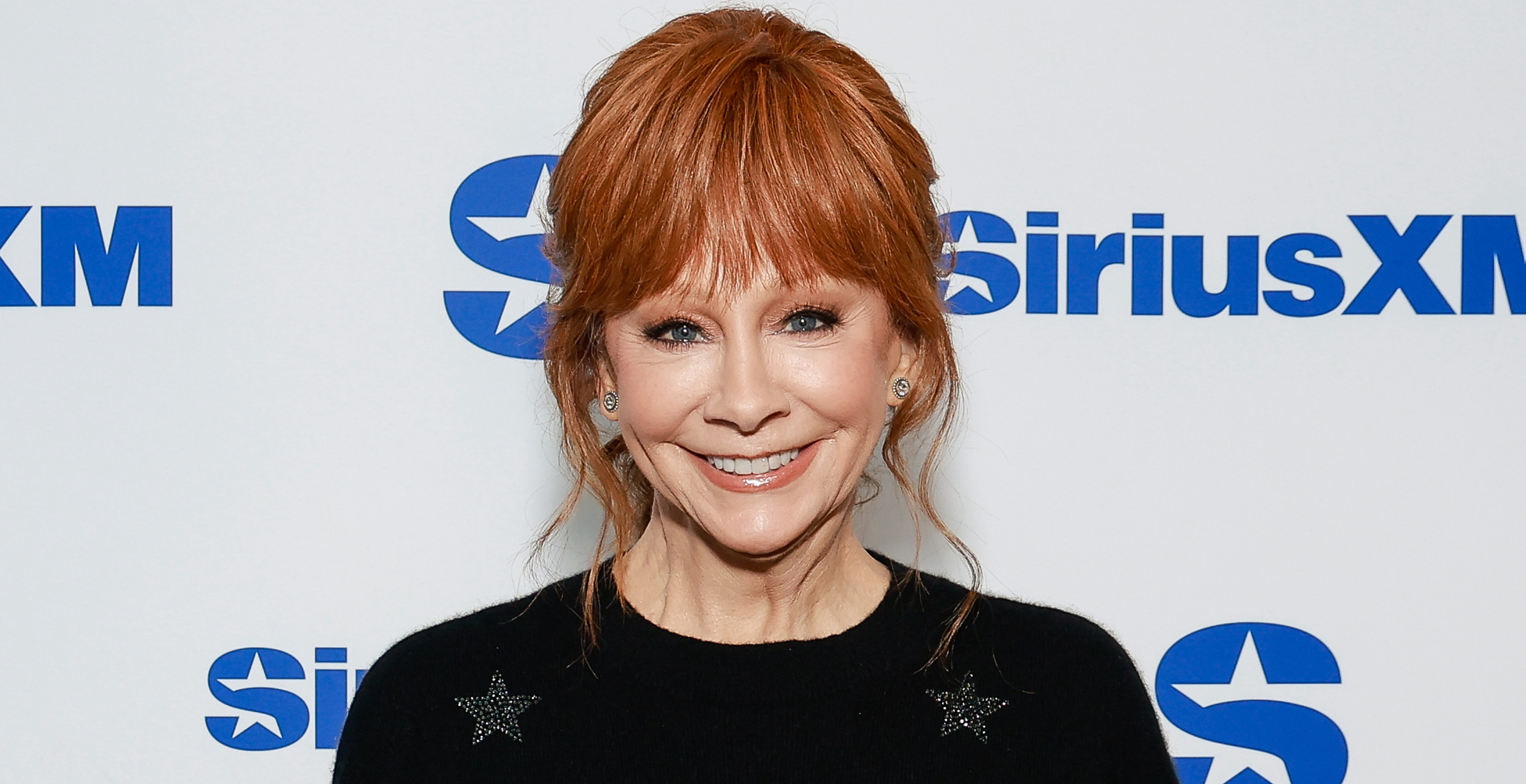 Reba McEntire Mashes Her Life on 'The Voice' with 'Happy's Place' in New Video