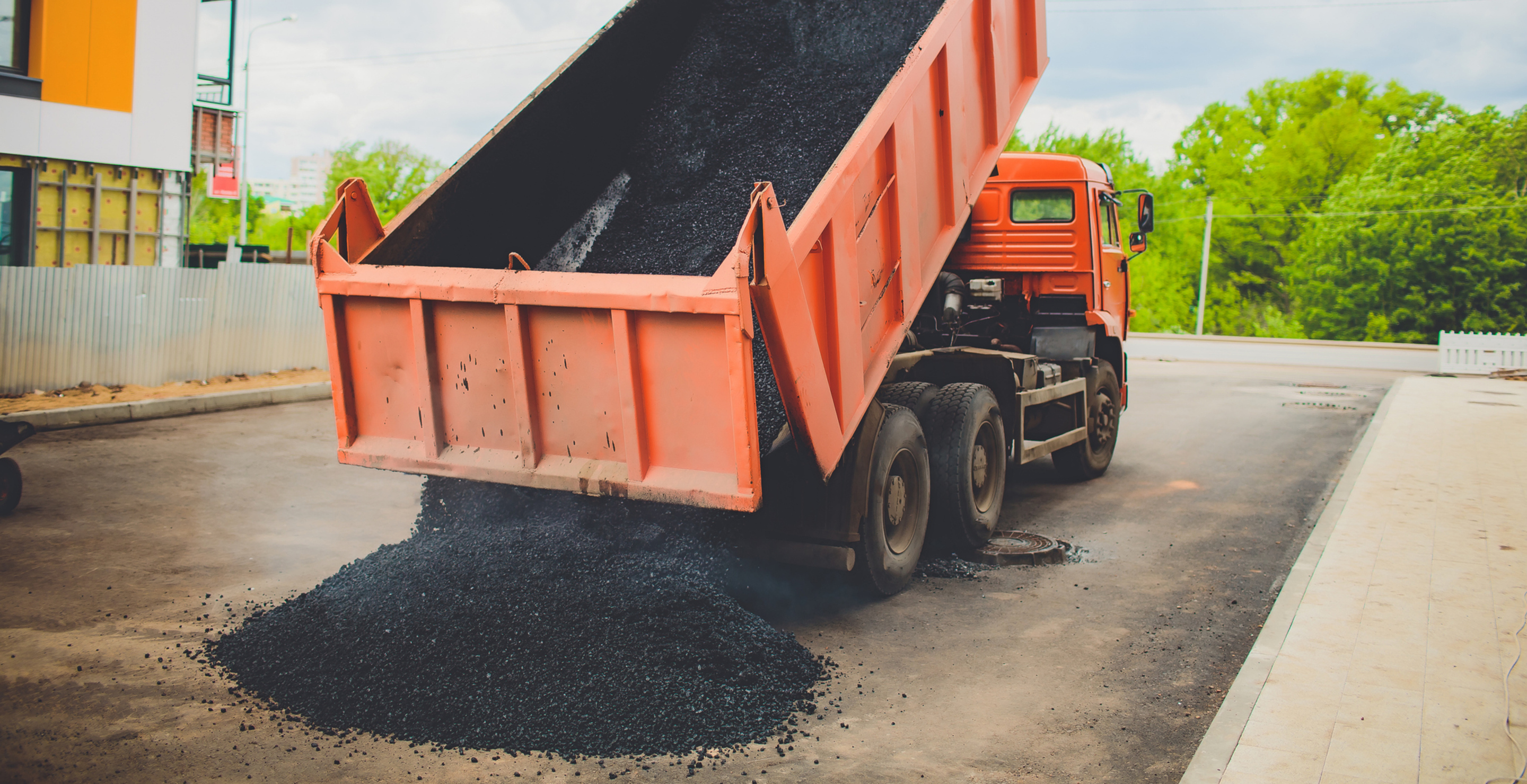 man buried under hot asphalt