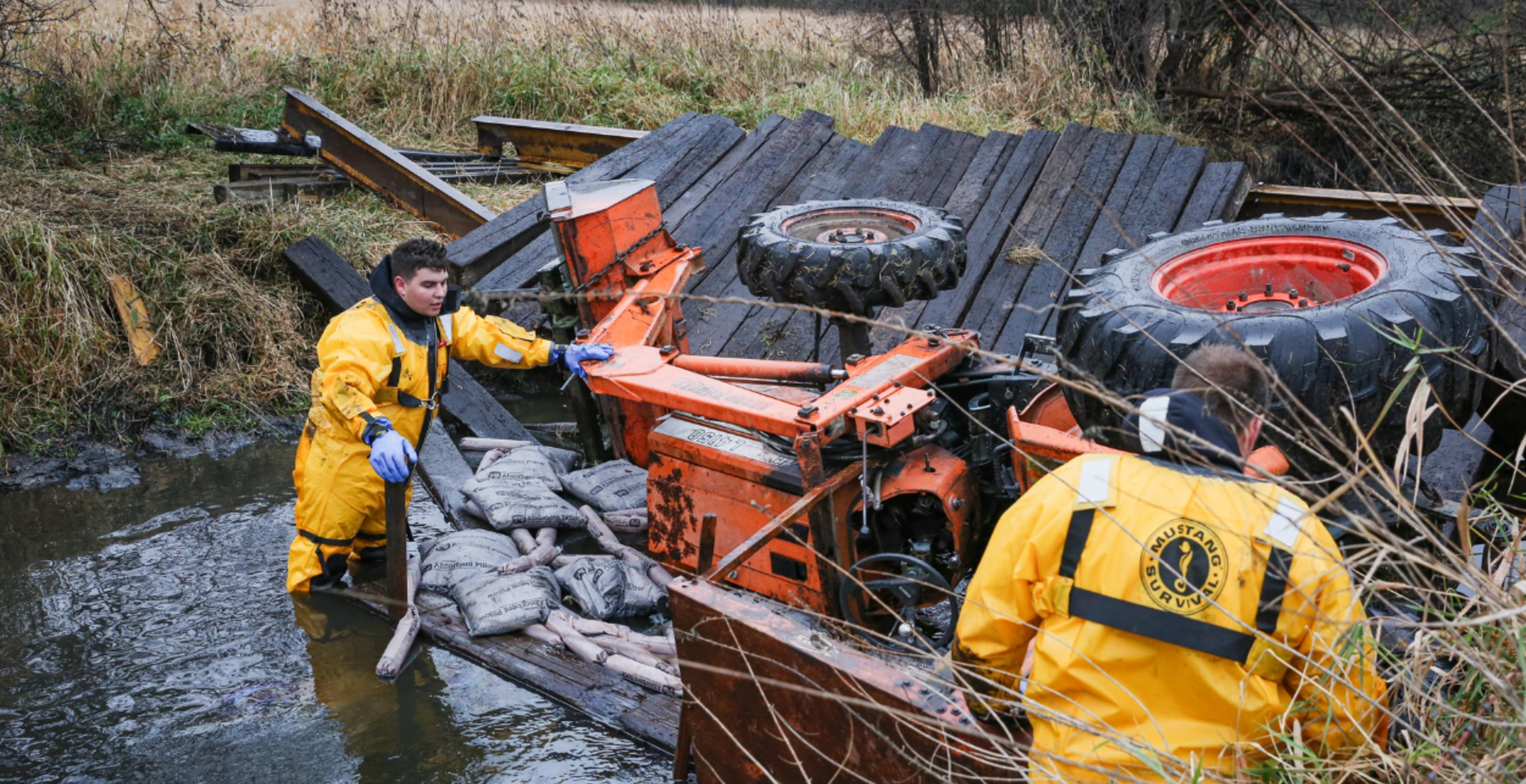 bridge collapse traps man in creek