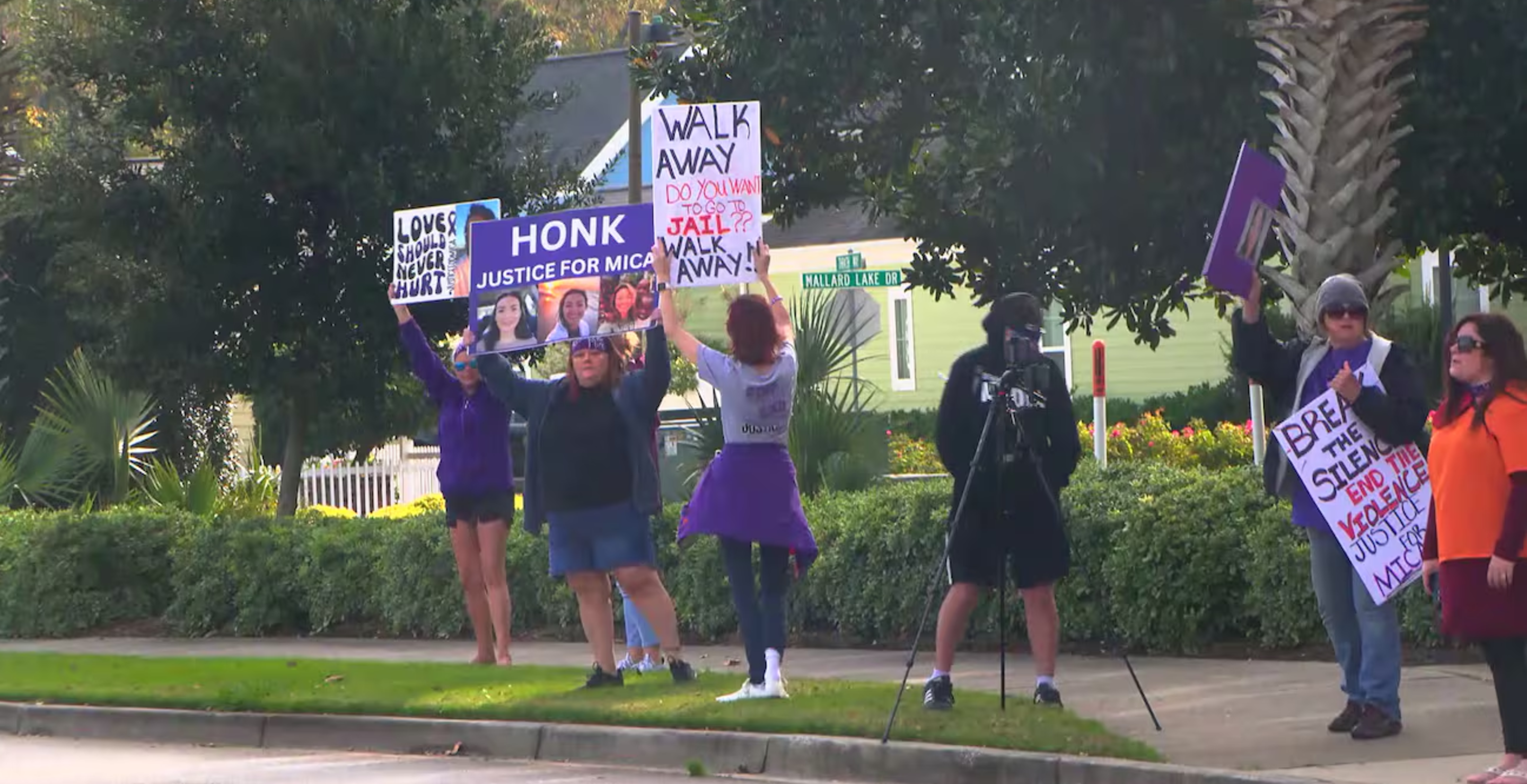 Protestors gather outside paul miller's house