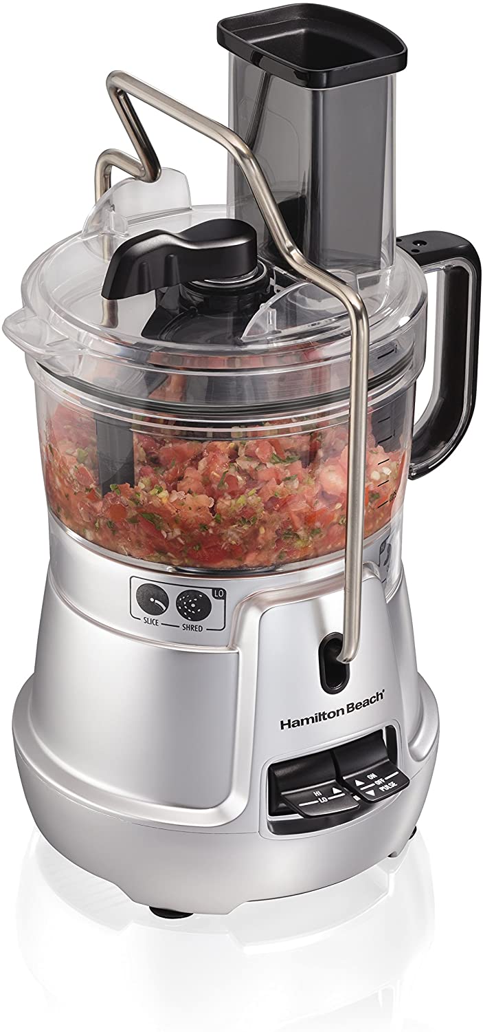 https://www.wideopencountry.com/wp-content/uploads/sites/4/eats/2021/05/Hamilton-Beach-Stack-Snap-8-Cup-Food-Processor-Vegetable-Chopper-with-Adjustable-Slicing-Blade-Built-in-Bowl-Scraper-Storage-Case-Silver-70820.jpg?resize=703%2C1500
